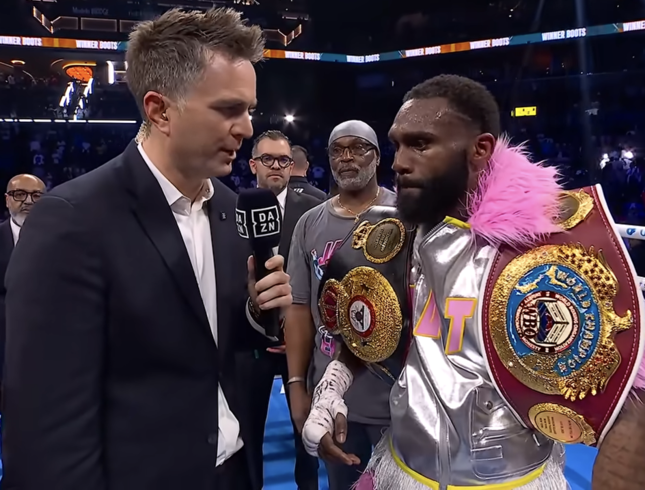 Jaron "Boots" Ennis wipes out Xander Zayas, becoming unified champion at 154 pounds